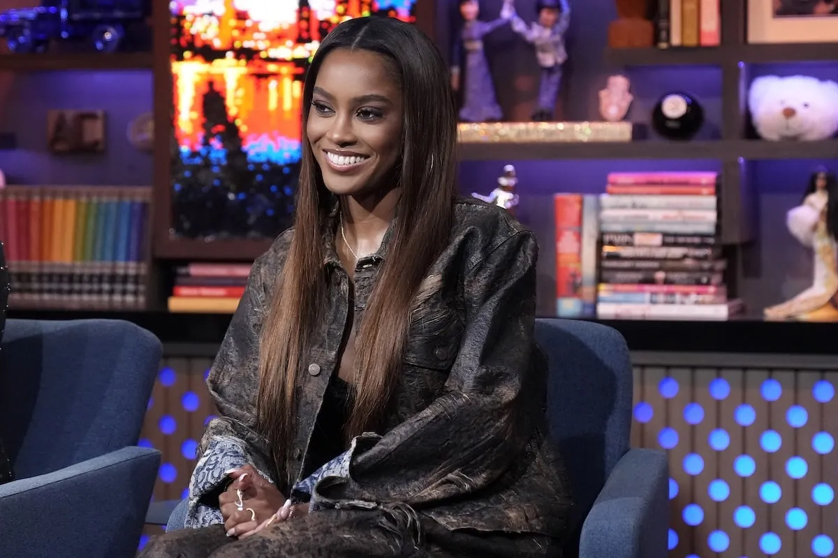 Wearing a distressed jacket and pants, Summer House star Ciara Miller films an episode of 'Watch What Happens Live!' in the Bravo studio