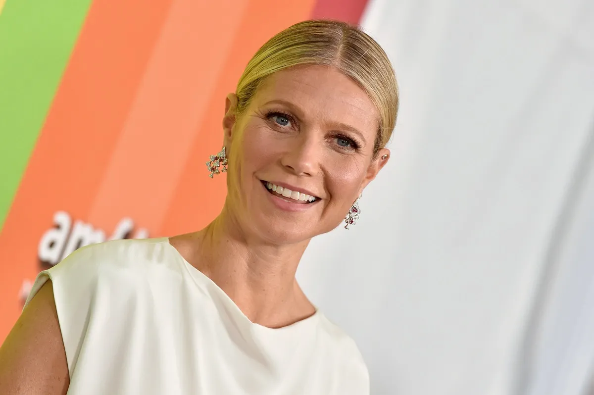 Gwyneth Paltrow attends the 2019 amfAR Gala Los Angeles at Milk Studios in a white dress.