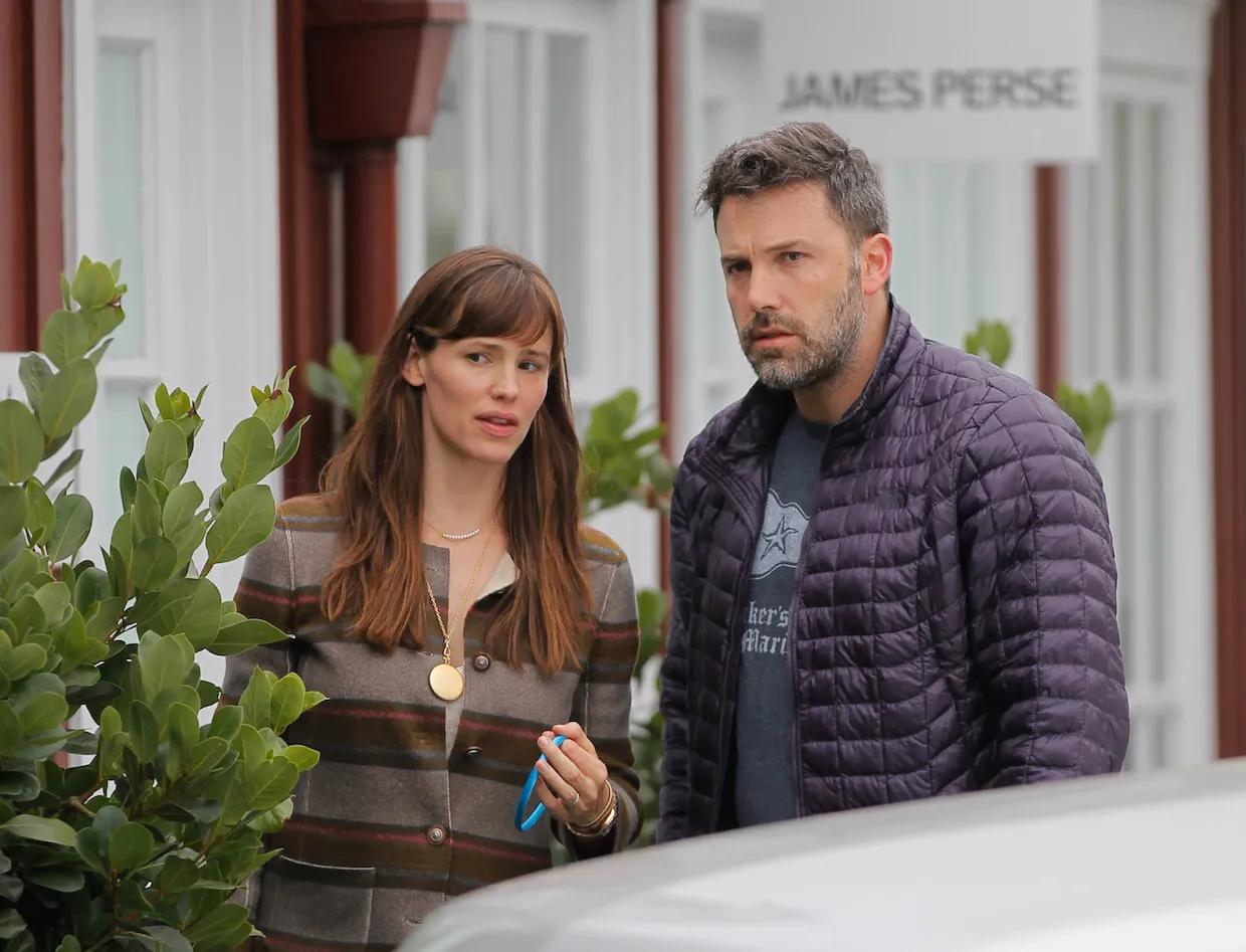 Jennifer Garner and Ben Affleck looking confused as they stare at something in front of them outside in LA