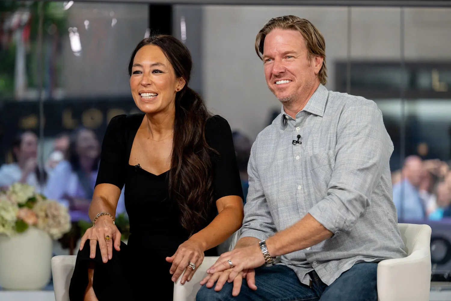 Chip and Joanna Gaines sitting next to each other on May 29, 2024