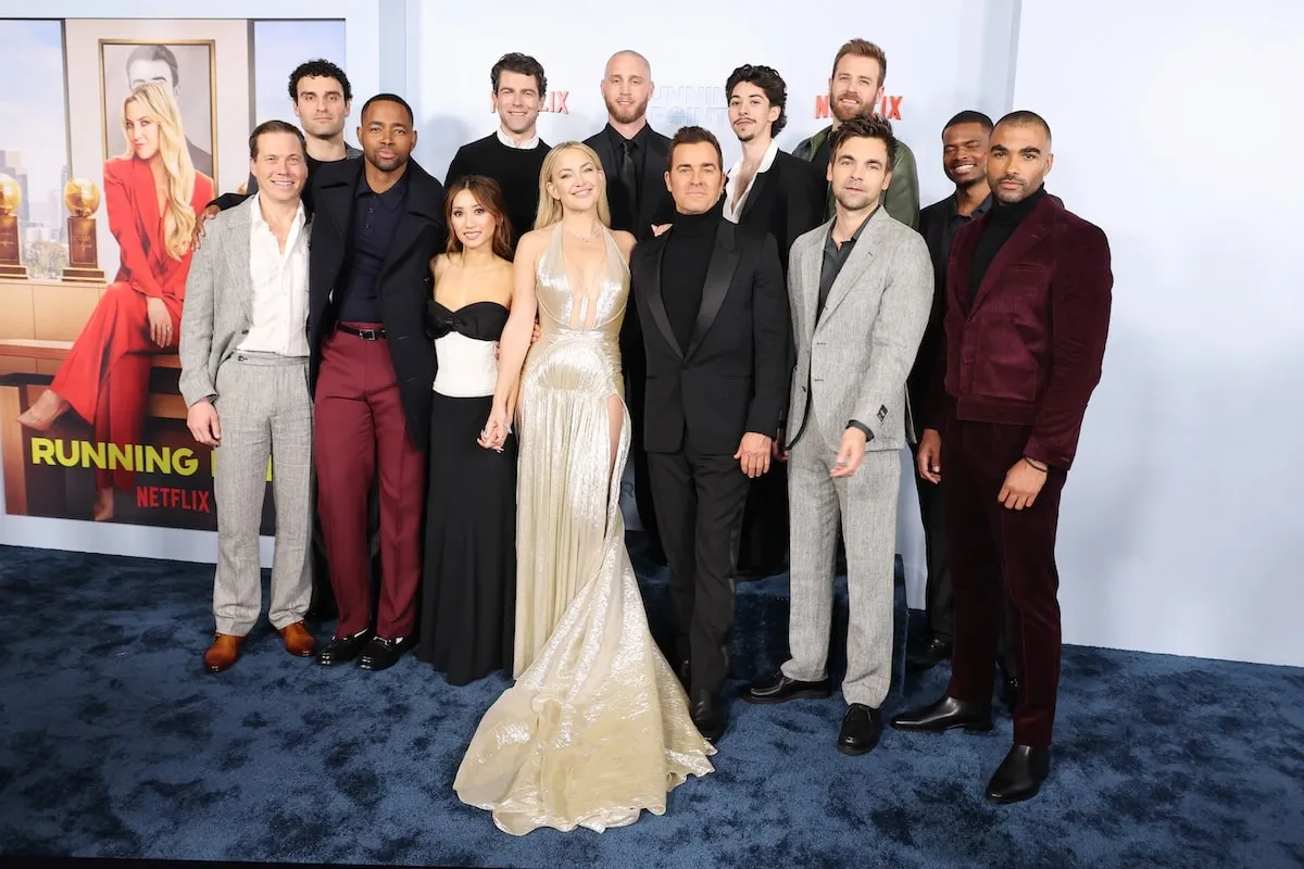 Cast of Running Point stand together on the red carpet before the premiere of the Netflix show