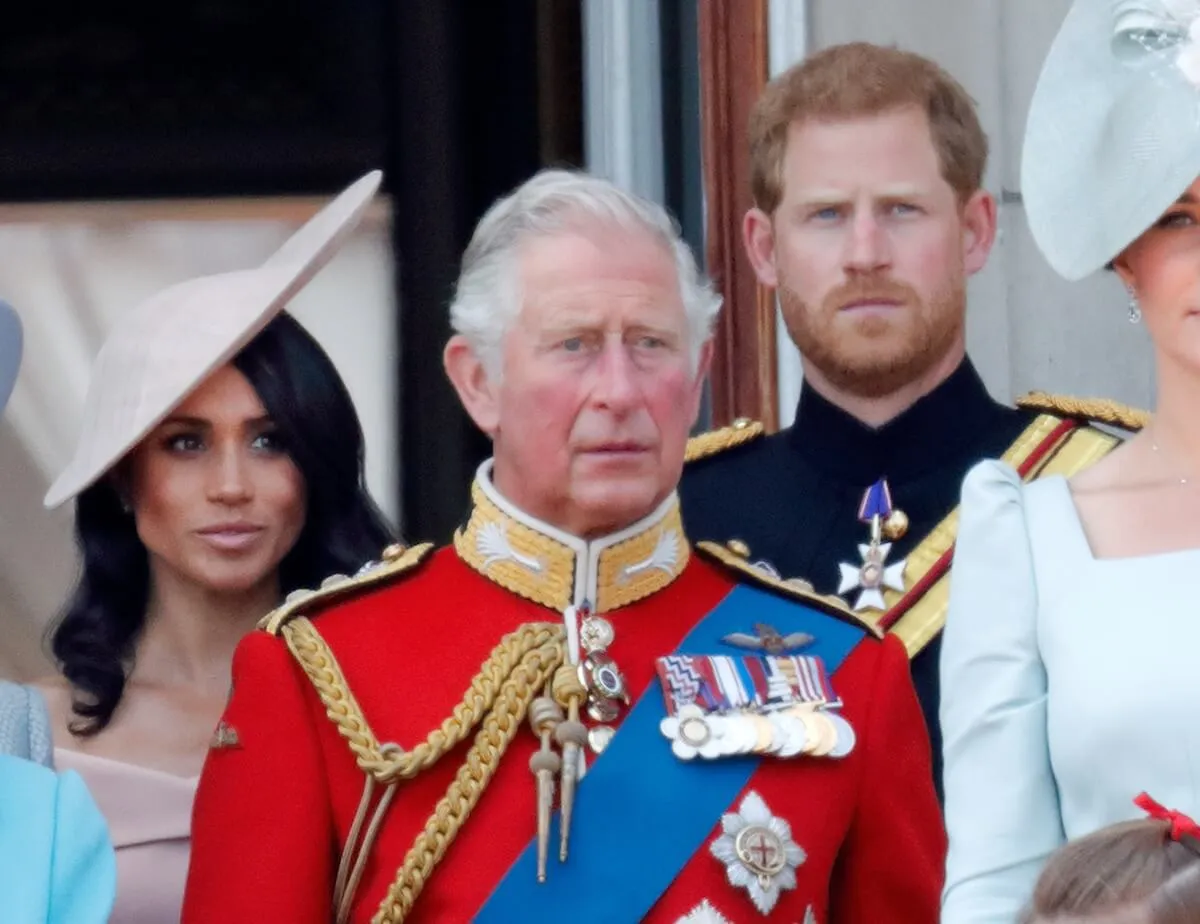 King Charles with Prince Harry and Meghan Markle