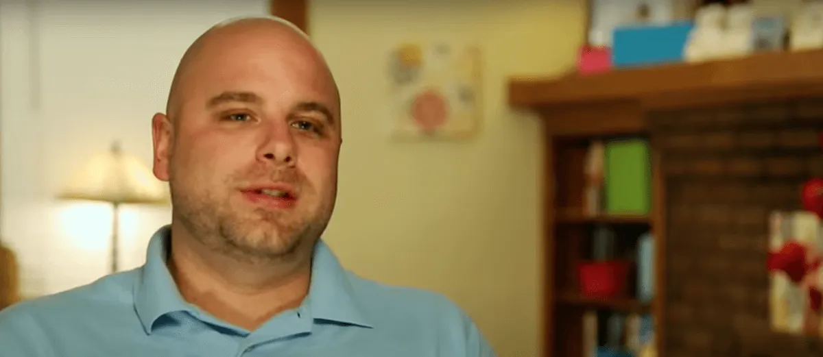 Michael Eloshway, wearing a polo shirt, in '90 Day Fiance' Season 1