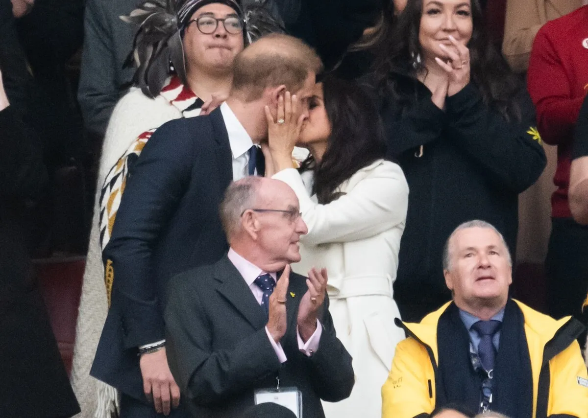 Prince Harry and Meghan Markle share a kiss at the 2025 Invictus Games